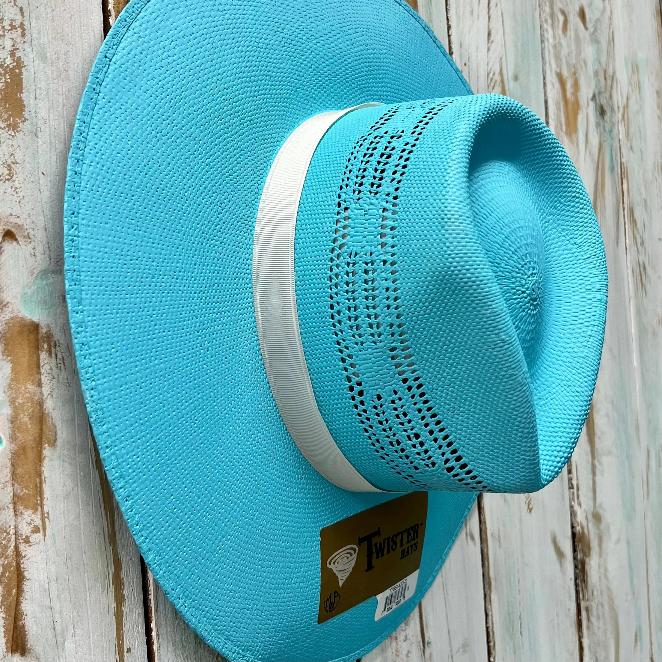 Rolling Around In The Turquoise Straw Hat